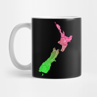 Colorful mandala art map of New Zealand with text in pink and green Mug